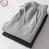 Men's Trendy Spring Solid Color Loose Fit Cuffed Nine-Point Sports Pants