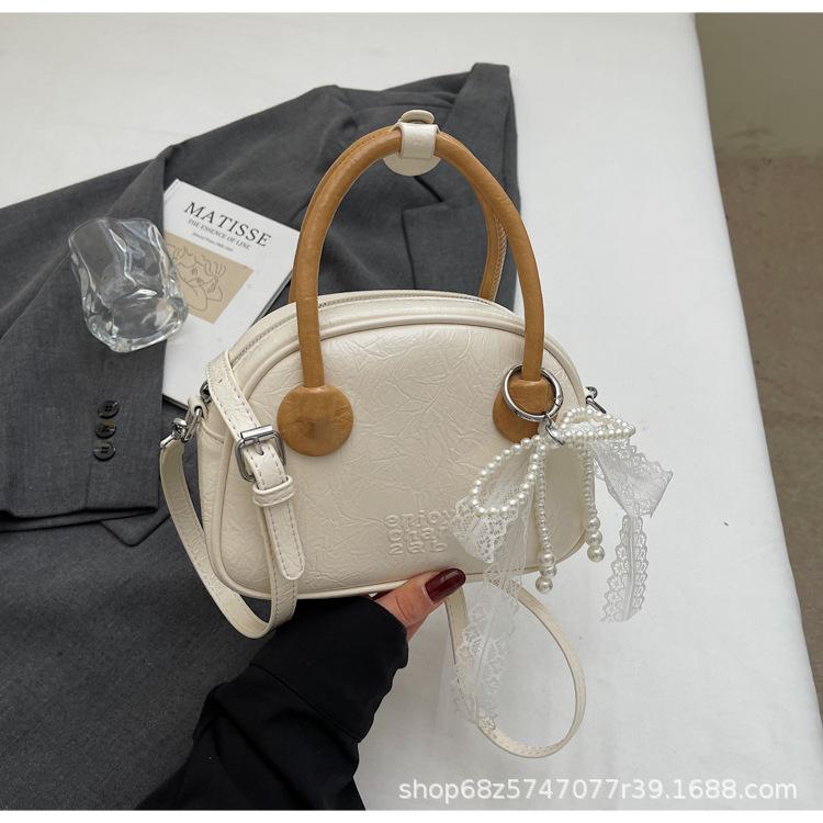 Korean Version of Ins Fashion Hand-held Bowling Bag Women's 2025 Simple and Versatile Shoulder Bag High-end Casual Crossbody Bag