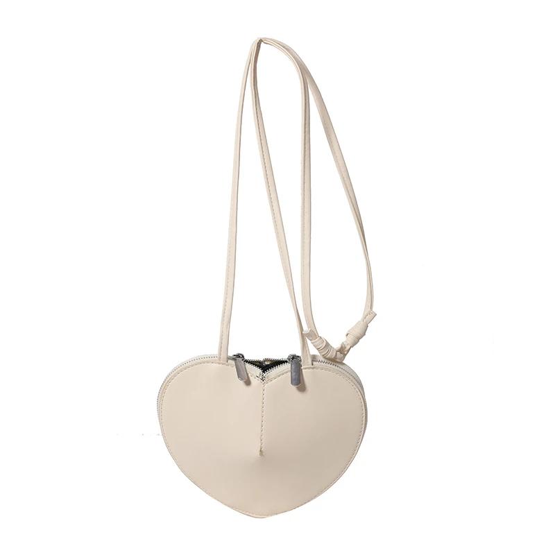 Мягкие сумки через плечо из искусственной кожи в форме сердца для женщин, новые модные однотонные маленькие сумки через плечо, дизайнерские роскошные сумки на молнии