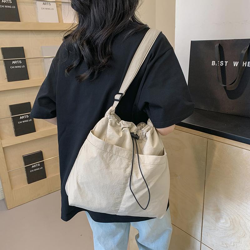 Женская модная сумка на плечо, большая вместительная нейлоновая сумка-ведро на шнурке, простая сумка-мессенджер с регулируемым ремешком для путешествий на открытом воздухе