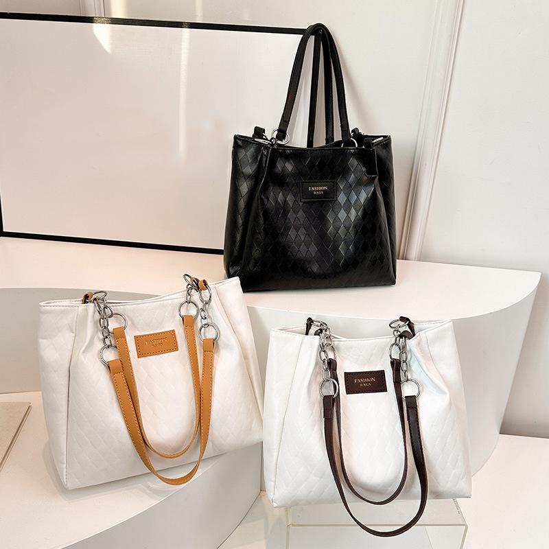 Новые женские модные повседневные сумки-тоуты с высококлассной текстурой для деловых поездок, универсальная сумка через плечо большой вместимости однотонного цвета CLE