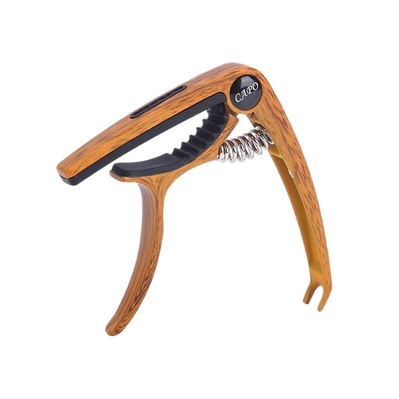 Профессиональный каподастр для акустической, классической, электрогитары, баса и укулеле