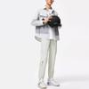 Мужские спортивные брюки Li Ning Wade Series, однотонные, зауженные, с несколькими карманами, плетеные, серебристо-серые, AYKU013-2