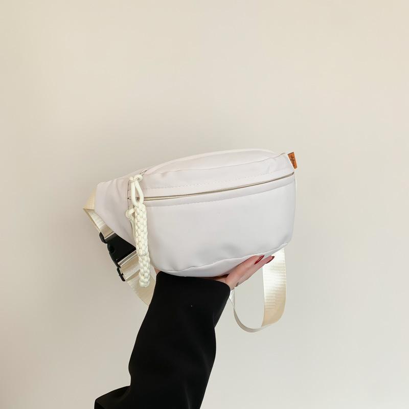 Модная сумка через плечо на груди, повседневная сумка из холста, женская новая модная повседневная спортивная нишевая модная однотонная поясная сумка