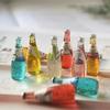 Кулон и брошь в виде бутылки напитка из смолы ручной работы