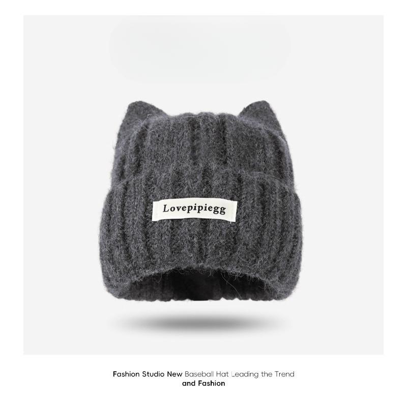 Осень и Зима Женский Темперамент Шапка Вязаная с Кошачьими Ушками Корейская Версия Теплая Толстая Шапка Пуловер Защита Ушей для Катания на Открытом Воздухе Милый Тренд
