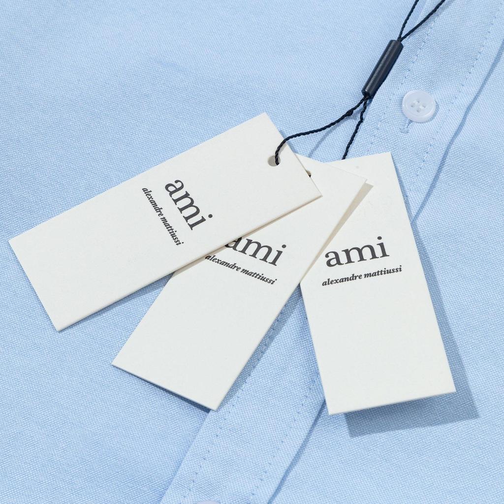 AMI Осень 2025 Новый продукт Нагрудный карман Классическая Невидимая 3D Вышивка Маленькая Любовь Повседневная Хлопковая Однотонная Рубашка с Длинным Рукавом