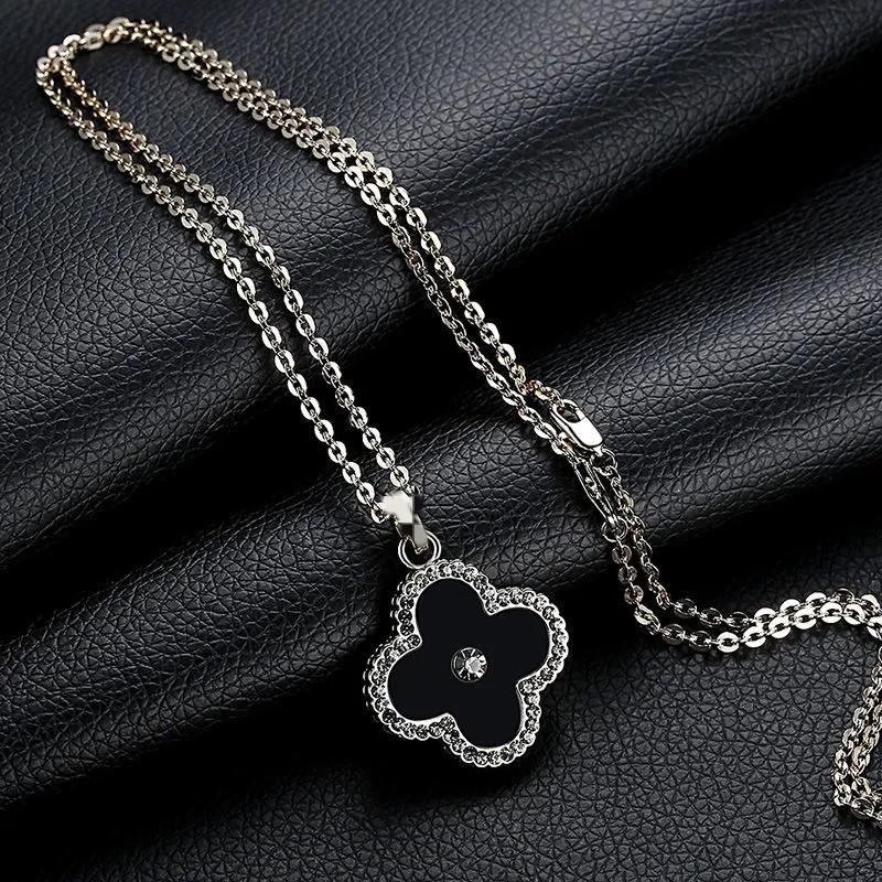Titanium Four Steel Jmxd Stunning Leaf Clover Pendant Sweater Chain Necklace High End Elegant Womens Fashion Jewelry Lucky Charm Gift Idea