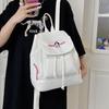 Japanese Student Casual Backpack with Embroidered Puppy Design, Drawstring Closure, and Matching Small Bag for Daily Use.