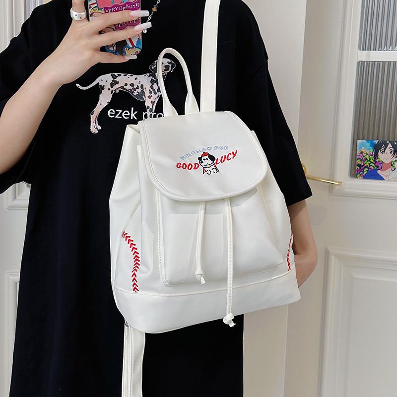 Japanese Student Casual Backpack with Embroidered Puppy Design, Drawstring Closure, and Matching Small Bag for Daily Use.
