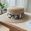 Summer new short brim flat top top top hat sunscreen sunshade sun hat British retro fashion straw hat woman