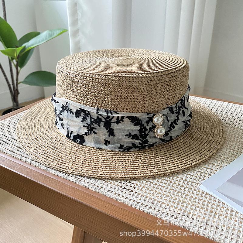 Summer new short brim flat top top top hat sunscreen sunshade sun hat British retro fashion straw hat woman