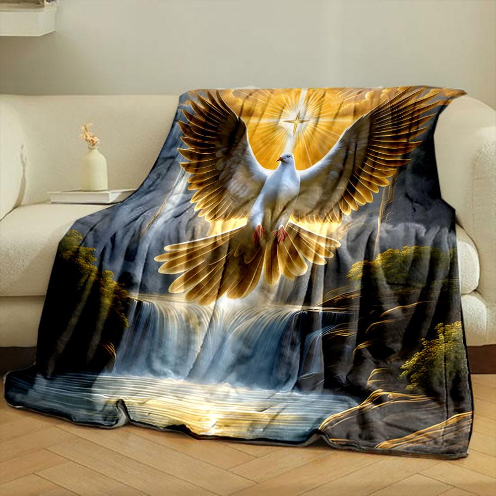 A radiant dove with spread wings illuminated by golden light over waterfalls. for all seasons blanket lunch break throw gift
