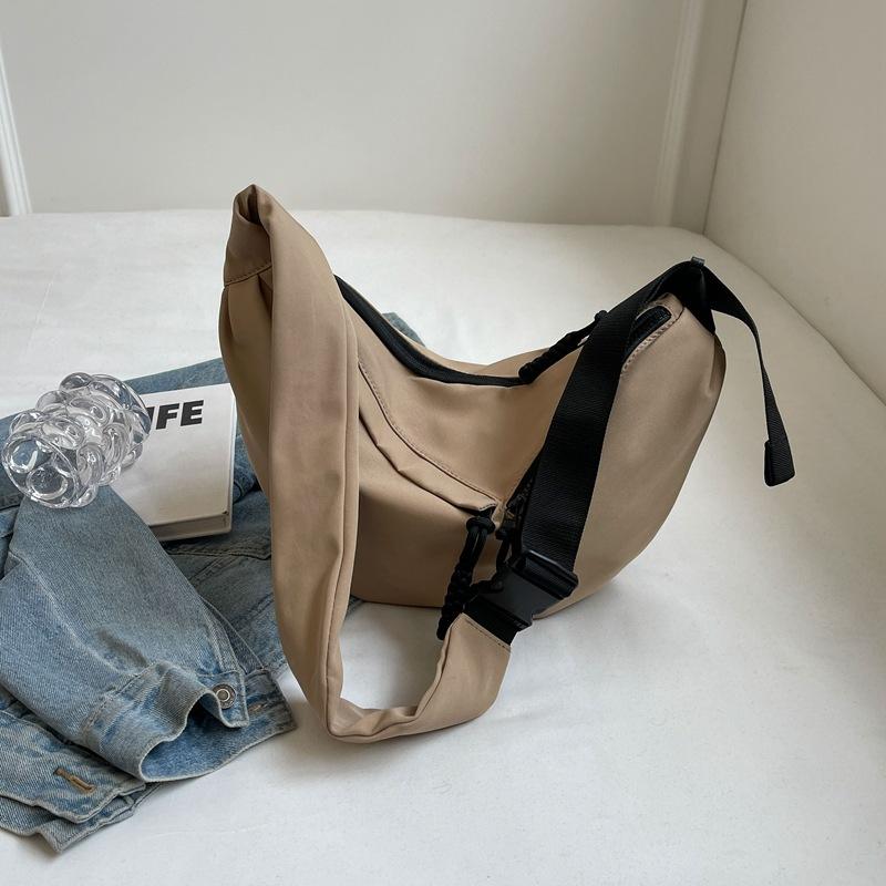 Сумка большой вместимости женская 2025 новая сумка через плечо повседневная корейская версия однотонная сумка-мессенджер трендовая студенческая персонализированная сумка-пельмень