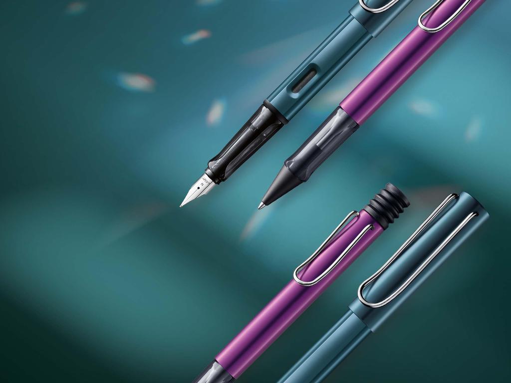 Lamy Перьевая ручка черного фиолетового цвета Эргономичная ручка и черное стальное перо Размер EF Легкий алюминиевый корпус В комплект входит синий картридж LAMY T 10 AL-star - - - -