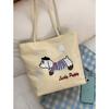 Canvas bag design sense niche underarm bag women 2025 new simple cartoon puppy tote bag shoulder bag portable