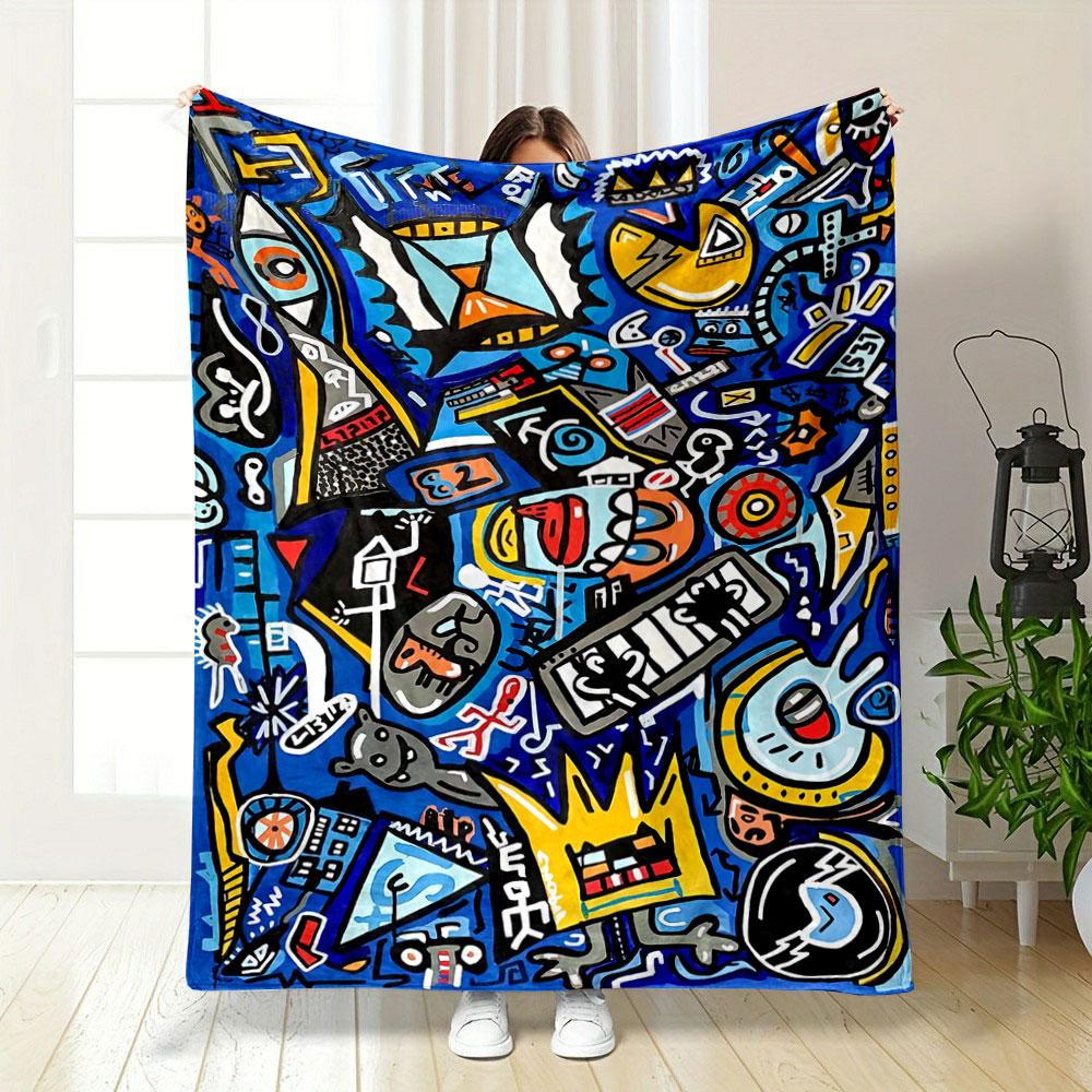 Bold abstract shapes, symbols, and objects on vibrant blue background. for all seasons blanket lunch break throw gift