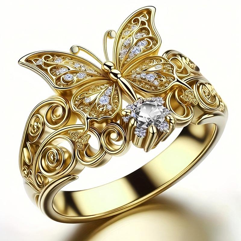 Artistic and vintage butterfly ring with intricate carvings, a unique and niche design, and a versatile style