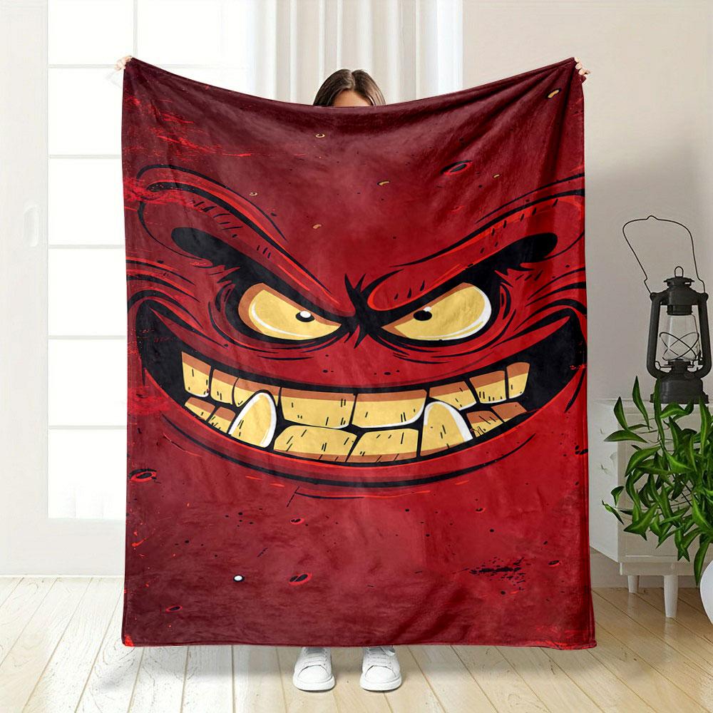 A menacing red face with sharp teeth, angry eyes, and bold expressions. for all seasons blanket lunch break throw gift