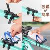 Bicycle bottle cage mounting adapter Made of silicone, lightweight, with