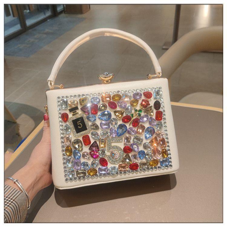 Light Luxury New Leather Fashionable Rhinestone Retro Clip Niche Handbag