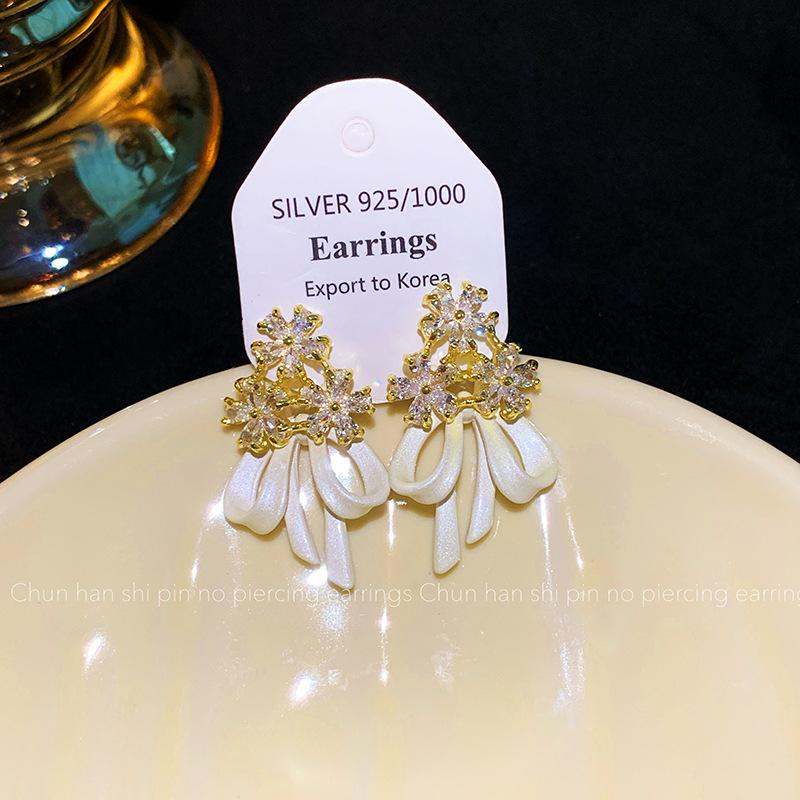 French zircon bow flower earrings, earrings clips, mosquito coil disc, no earholes, light luxury, high-end stud earrings, temperament earrings.
