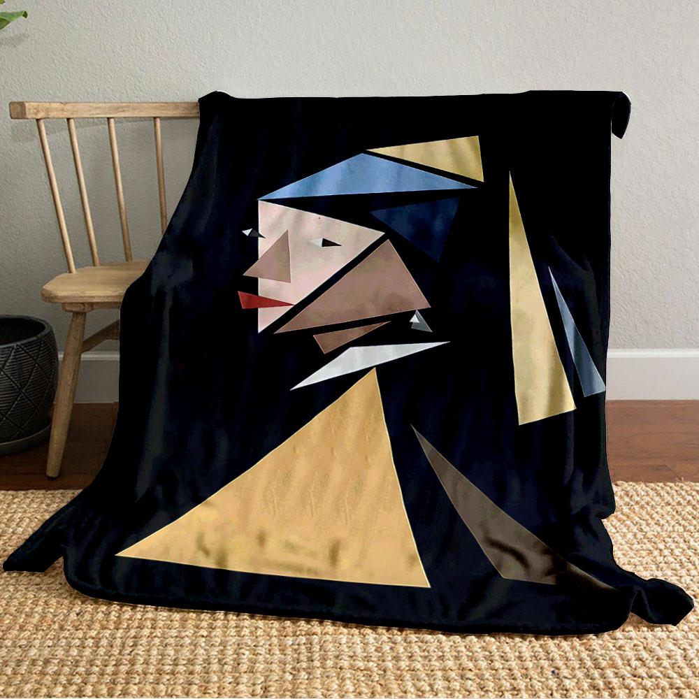 Geometric triangular shapes form an abstract portrait against a dark background. for all seasons blanket lunch break throw gift