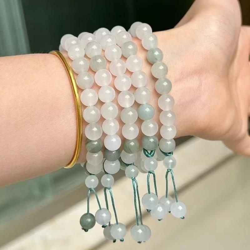 Женский браслет из нефрита «Золотой шелк Тяньшаня» с белым плавающим цветочным узором