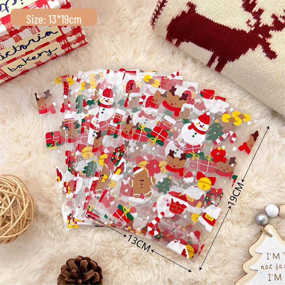 Прозрачный подарочный пакет с яблоками и конфетами на Рождество для пар