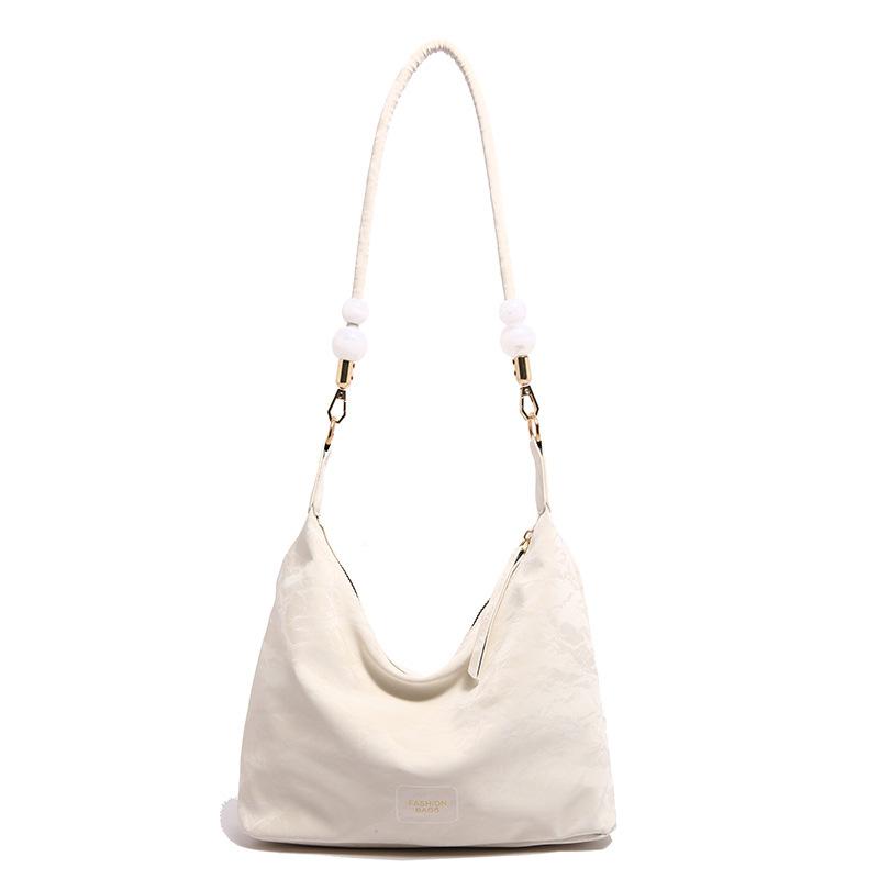 Повседневная сумка с мягкой поверхностью и нишевым дизайном для женщин 2024 года, новая популярная универсальная сумка-мессенджер, модная сумка через плечо под мышкой