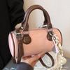 Hand-held high-end bowling bag women's 2025 new fashion shoulder bag simple casual niche crossbody bag