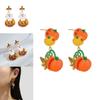 Whimsical Long Pumpkin Earrings For Halloween Featuring Cute Cartoon Characters In Alloy