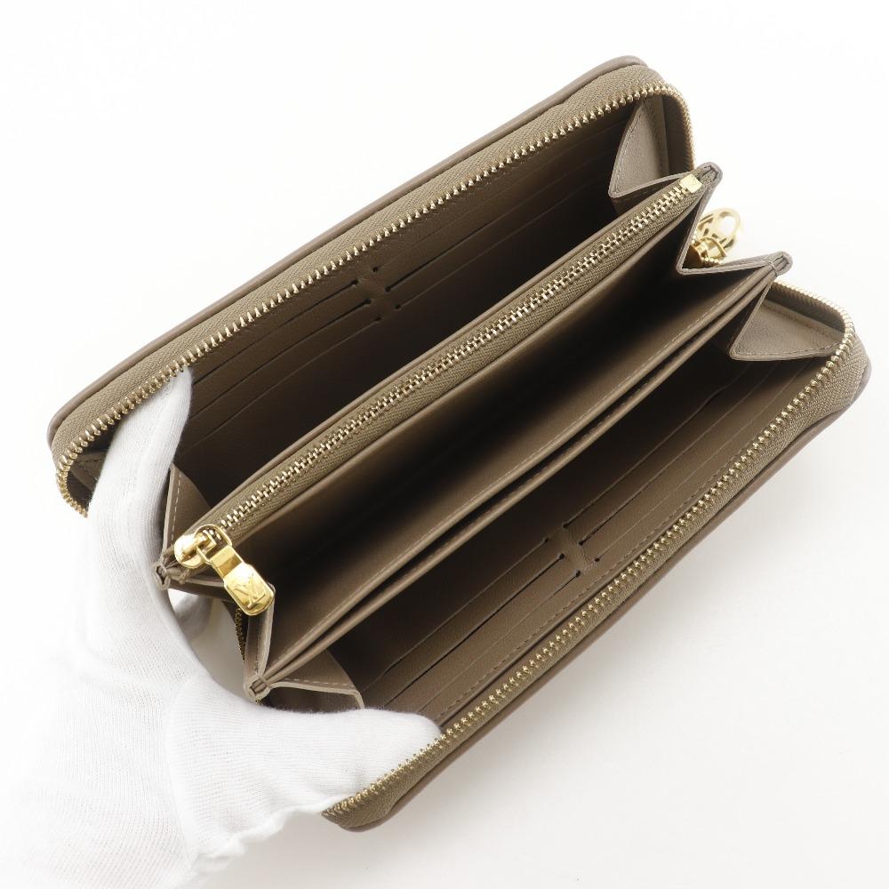 Louis Vuitton Zippy Wallet Purse M81511 Monogram Coussin Taupe Beige Lambskin Women Used
