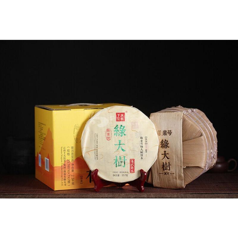 Yiwu Green Big Tree XY Сягуань Пуэр Юньнань Пуэр Железный чайный торт сырой 357г