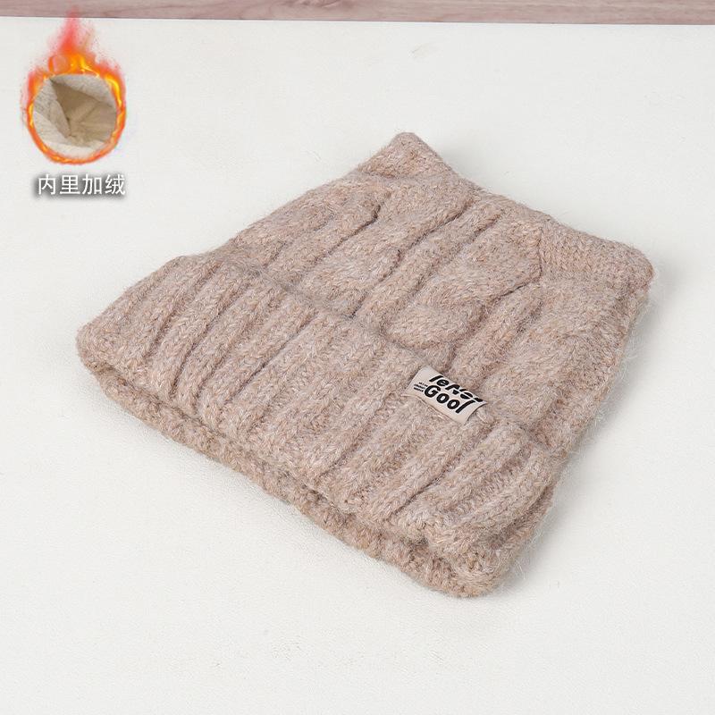 Autumn and winter solid color simple labeling ear decoration knitted hat outdoor travel windproof warm street shot wool hat