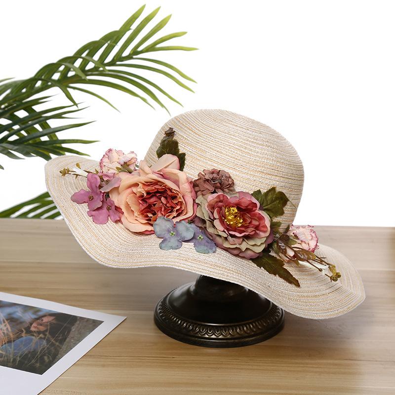 Summer new sunscreen sunshade flower straw hat women's beach travel hand-woven hat foldable big eaves hat