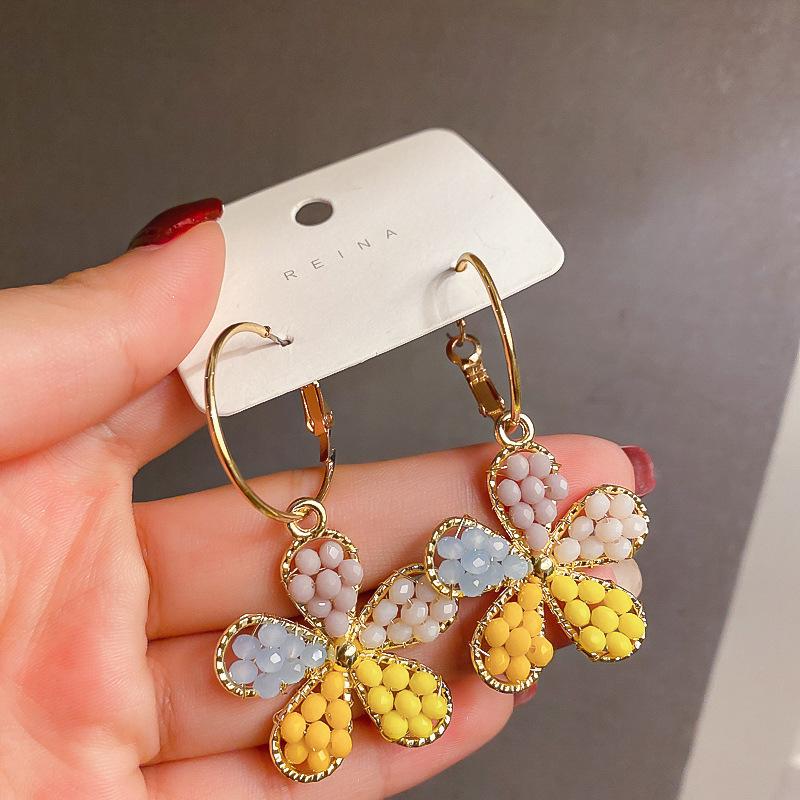 Colored rice beads five-petaled flower ear buckles small fresh and sweet versatile earrings 2025 early spring new atmosphere earrings