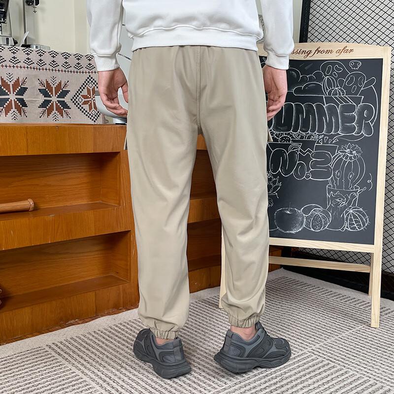 New Balance Трикотажные штаны мужские светло-хаки умеренные AMP34315-SOT