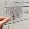 European & American Fashion Silver Needle Cross Earrings – High-End Niche Design for Women