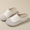 Retro flat-bottomed bag head wearing cool slippers women's 2025 summer height increase hollow half slippers woven breathable shoes