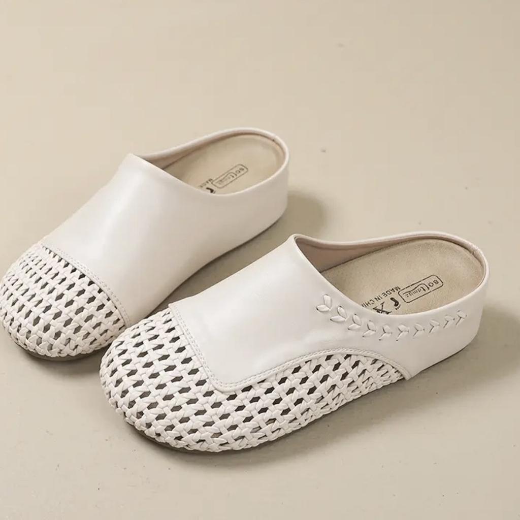 Retro flat-bottomed bag head wearing cool slippers women's 2025 summer height increase hollow half slippers woven breathable shoes