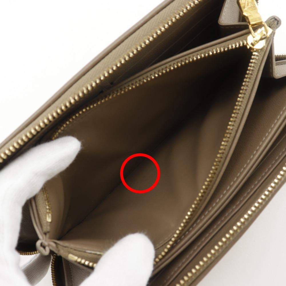 Louis Vuitton Zippy Wallet Purse M81511 Monogram Coussin Taupe Beige Lambskin Women Used