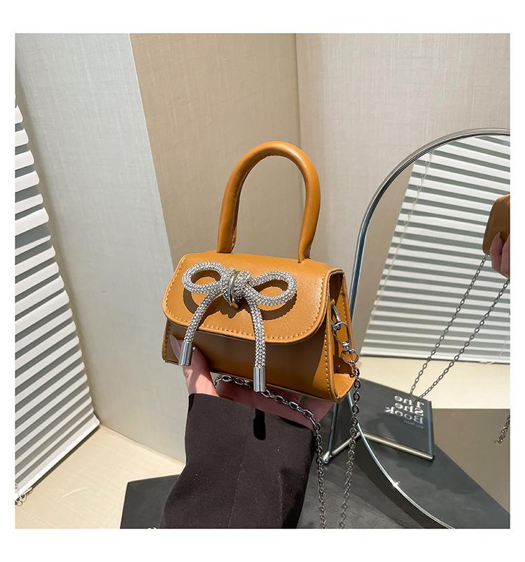 Французский нишевый дизайн премиум мини-сумка 2025 для девочки с бантом, цепочкой, для помады, наушников, сумка-мессенджер, тренд