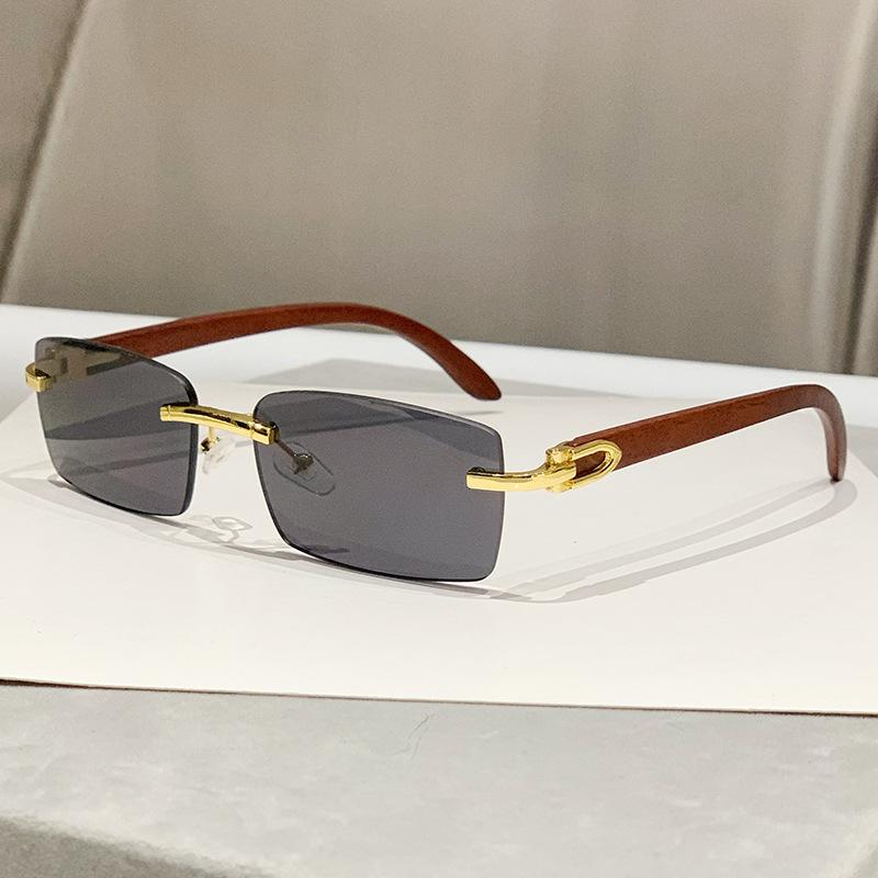 New frameless trimmed personalized sunscreen sunglasses catwalk travel fashion versatile wood grain legs advanced sunglasses