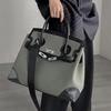 Autumn/Winter Platinum Leather Tote: Retro, Casual Canvas Bag – Handheld, Shoulder, or Messenger Style for Women.
