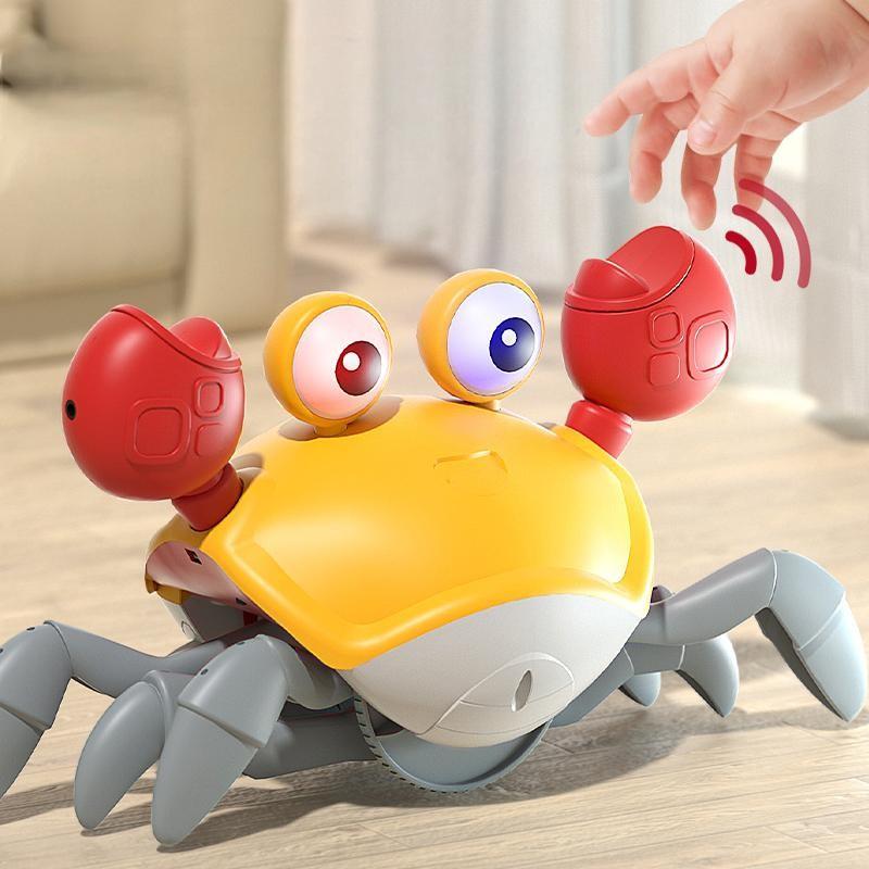 Электрическая развивающая игрушка-краб, которая умеет ползать, двигаться и убегать, чтобы привлечь малышей в возрасте от 1 до 2 лет