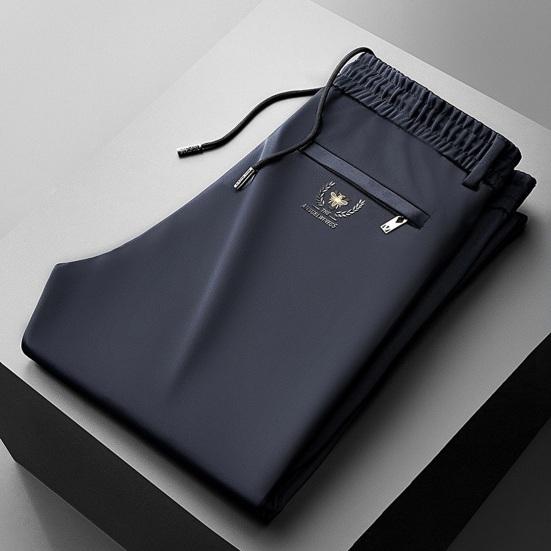 Мужские брюки Свободные прямые шнурки с эластичной резинкой на талии 2 боковых кармана Сплошной цвет Дышащие мягкие повседневные спортивные штаны полной длины Повседневные длинные спортивные брюки