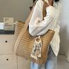 2025 New Straw Plaited Woven Women's Roomy Bag Casual Versatile Single Shoulder Bag High Capacity Seaside Beach Bag Vacation Commuter Large Tote Bag