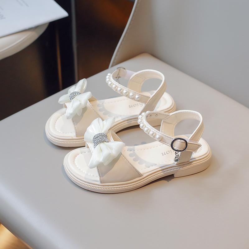 Сандалии для девочек, универсальный бант со стразами, детская повседневная обувь 2024 года, новые простые жемчужные модные туфли принцессы, детские туфли на плоской подошве из искусственной кожи