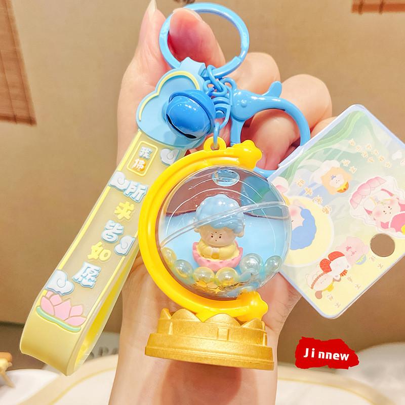 Playful Cartoon Buddha Earth Globe Hanging Ornament For Creative Keychain Designs